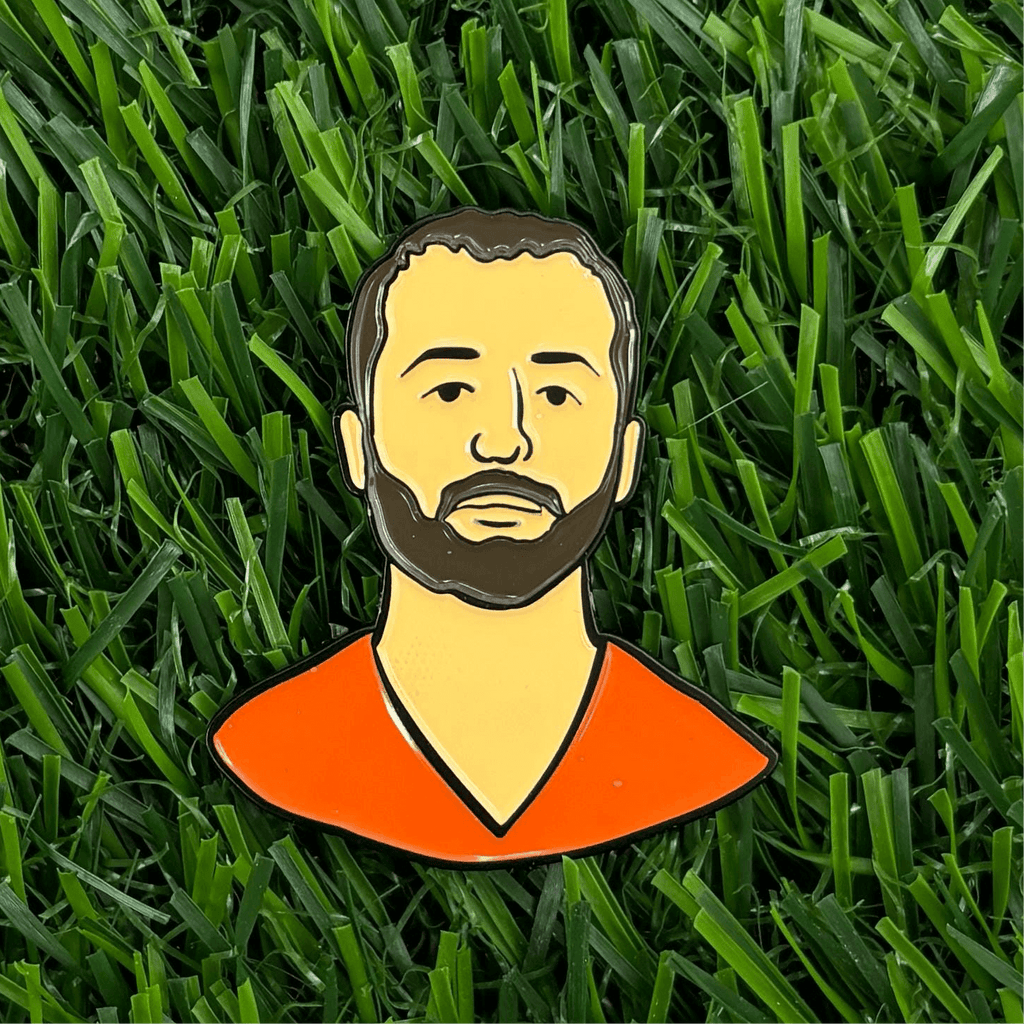 Prison Scotty custom golf ball marker on green grass – premium, durable, and stylish golf accessory for golfing enthusiasts.