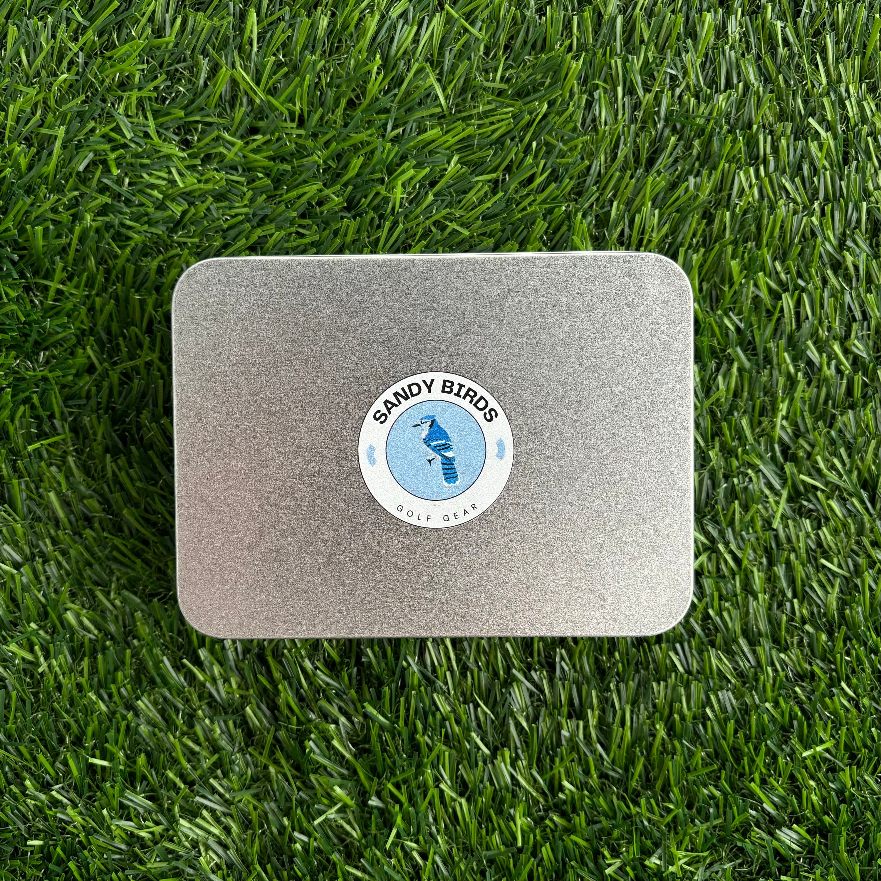 Golf marker and divot tool package featuring high-quality, stylish designs. Includes a durable golf ball marker and an essential divot repair tool, perfect for any golfer's kit.