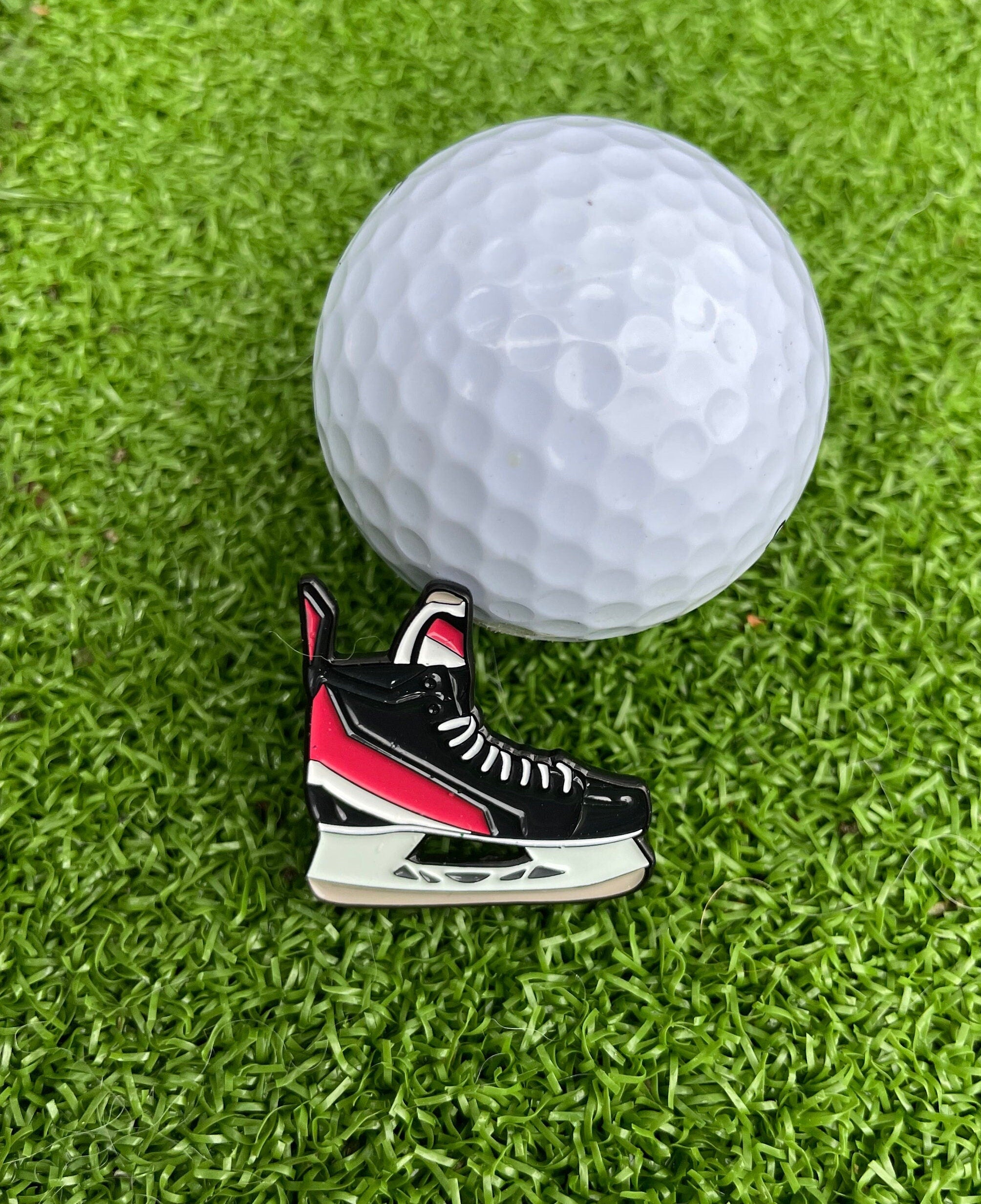 Premium golf ball markers with unique and stylish designs, crafted for durability and enhancing your golf game.